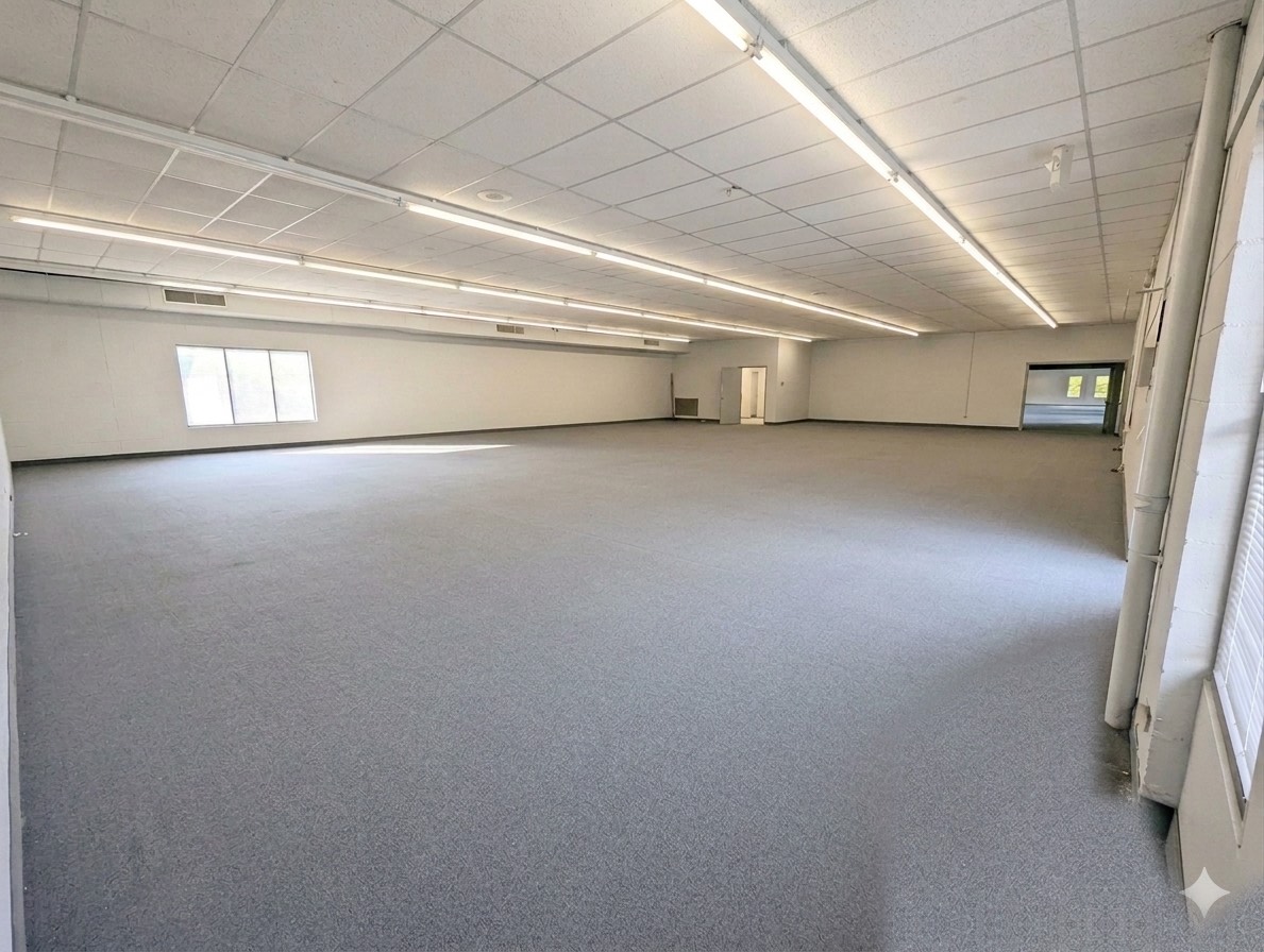 The new buying club location — an open interior space being prepared for the move